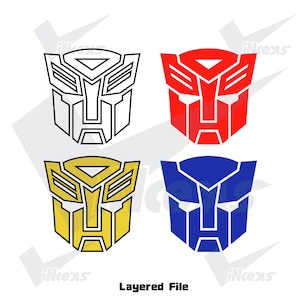 May include: Four stylized robot face designs in black and white, red, yellow, and blue. The image includes the text "Layered File". The designs are symmetrical and geometric, with sharp angles and distinct shapes.