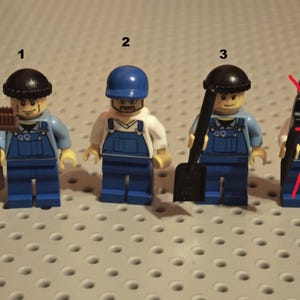 May include: Four LEGO minifigures labelled 1 through 4. Figures 1 and 3 wear blue overalls and black hats, holding a brown rake and black shovel. Figure 2 wears blue overalls and a blue cap. Figure 4 wears blue overalls and a blue cap with a red X.