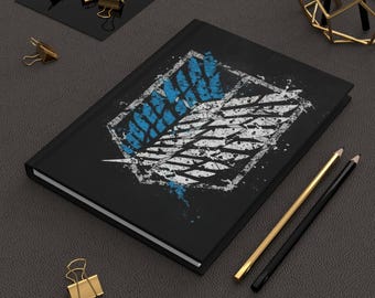 Cuadernos de tapa dura con temática de Ataque a los Titanes
