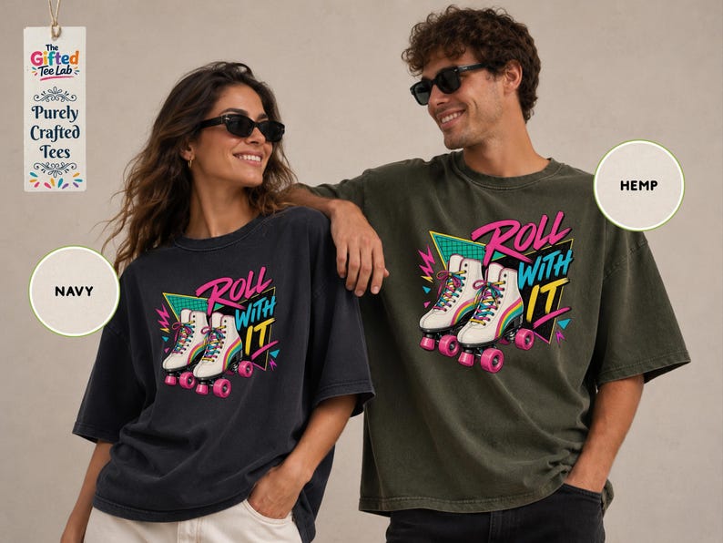 A woman and a man are posing together, both wearing t-shirts with a graphic design featuring rollerblades and the text "Roll with it".