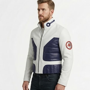 May include: A white and navy blue leather jacket featuring a high collar with a circular detail, a full-length front zipper, and a circular patch on the left sleeve displaying a red kangaroo graphic. The torso has horizontal quilted paneling.