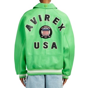 May include: A bright lime green leather varsity jacket featuring the text AVIREX in black letters arched above a circular patch with a flag design and the text ALL AMERICANS ESTABLISHED 1975, with the word USA in black letters below the patch.