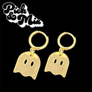 May include: A pair of gold-toned hoop earrings featuring dangling ghost-shaped charms with two oval cutouts for eyes. The text "Pick & Mix" is displayed in the upper left corner in a stylized white font with a black outline against a black background.