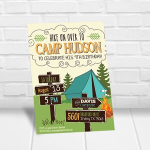 May include: A camping-themed birthday invitation with a cartoon illustration of a tent, a campfire, and a signpost with the text "HIKE ON OVER TO CAMP HUDSON TO CELEBRATE HIS 9TH BIRTHDAY!"  The signpost also includes the date "SATURDAY AUGUST 13" and the time "5 PM". The invitation includes the address "5601 BRADFORD DRIVE IRVING, TX 75063" and the text "THE DAVIS CAMPSITE".