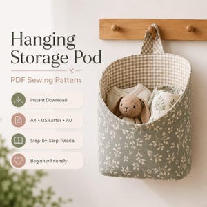 May include: A hanging storage pod sewing pattern featuring text that reads Hanging Storage Pod, PDF Sewing Pattern, Instant Download, A4, US Letter, A0, Step-by-Step Tutorial, and Beginner Friendly. The pod has a sage green leaf print.