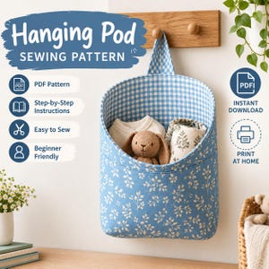 May include: A hanging fabric storage pod featuring a blue and white floral exterior and a blue and white gingham interior. The text reads Hanging Pod SEWING PATTERN, PDF Pattern, Step-by-Step Instructions, Easy to Sew, Beginner Friendly, INSTANT DOWNLOAD, PRINT AT HOME.