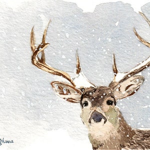 May include: Watercolor painting of a deer with large antlers, set against a snowy, light blue background. The deer's fur is brown and white, with a detailed depiction of its face and antlers. Snowflakes are falling.
