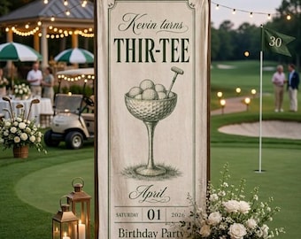 May include: A vertical rectangular banner with a cream-colored fabric background and dark green text and graphics. The banner reads Kevin turns THIR-TEE, April Saturday 01 2026 Birthday Party, and features a martini glass filled with golf balls.