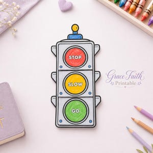 May include: A hand-drawn traffic light illustration featuring three circular lights colored red, yellow, and green. The red light contains the text STOP, the yellow light contains the text SLOW, and the green light contains the text GO. The traffic light has a gray frame and a small yellow circular topper.