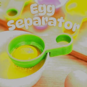 May include: A bright green plastic egg separator with a circular handle rests on the rim of a white bowl containing a raw egg yolk and white. The text Egg separator is printed in large white letters across the top of the image.