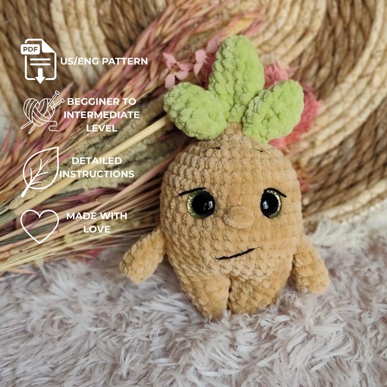 May include: A plush, tan-colored, root-shaped doll with a face, arms, and green leaves. The doll has large, glittery eyes and a stitched mouth. Text on the left side reads "US/ENG PATTERN", "Beginner to Intermediate Level", "Detailed Instructions", and "Made with Love."