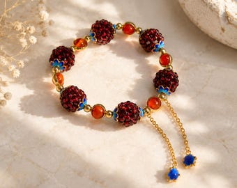 Bracelet fleur grenat : perles d'agate rouge avec chaîne dorée