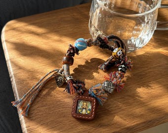 Bracelet tibétain amulette Zhaji Lhamo : bijoux ethniques tressés à la main dans des tons ocre