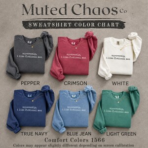 Six "apparently, I like fictional men" sweatshirts in Pepper, Crimson, White, True Navy, Blue Jean, and Light Green.