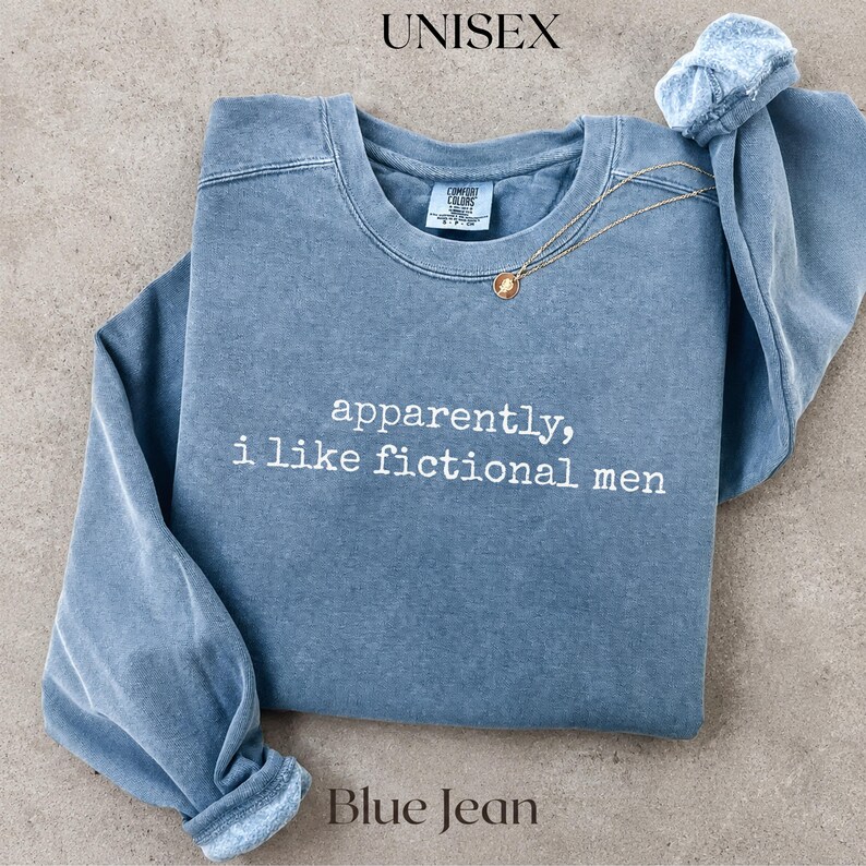 Blue Jean unisex sweatshirt with "apparently, I like fictional men" text.