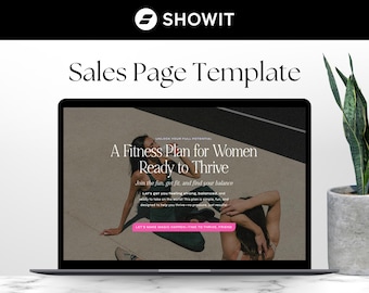 May include: A laptop computer displaying a website with a pink and white design. The website features a woman doing yoga on a black surface. The text on the website reads "A Fitness Plan for Women Ready to Thrive".