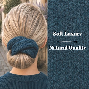 May include: A dark teal knitted hair accessory wrapped around a bun, featuring a textured yarn construction. The image includes the text "Soft Luxury" and "Natural Quality" displayed over a close-up view of the same dark teal knitted fabric.