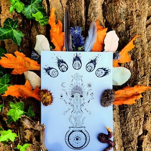 May include: A black and white illustration of a multi-armed deity with a headdress, surrounded by celestial symbols and flames. The artwork is on a white background, accented by orange leaves, green ivy, and feathers.