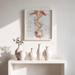 May include: A square wall art print featuring a grid background with a central illustration of a DNA strand intertwined with floral vines and a fetus at the base. Text reads: You knit me together in my mother's womb Psalm 139:13 and Before I formed you in the womb I knew you Jeremiah 1:5.