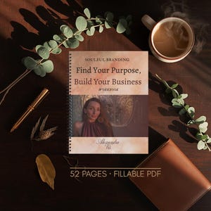 May include: A spiral-bound workbook titled "Find Your Purpose, Build Your Business" with the text "Soulful Branding." The cover features a woman's portrait. A gold pen, a leather wallet, and a cup of coffee are also visible. The workbook has 52 pages and is a fillable PDF.