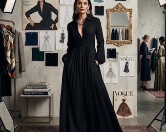 May include: A long black dress with a collared neckline and long sleeves. The dress has a button-down front and pockets. The background features fashion sketches, Vogue magazine covers, and a gold-framed mirror. The text "VOGUE" is visible.