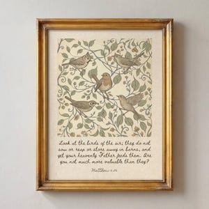May include: A framed print featuring four birds perched among intertwined branches and leaves. Below the illustration, the text reads: Look at the birds of the air; they do not sow or reap or store away in barns, and yet your heavenly Father feeds them. Are you not much more valuable than they? Matthew 6:26.