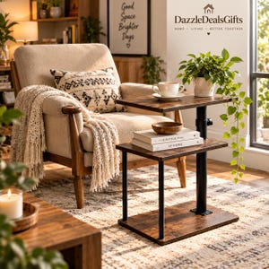May include: A two-tier side table with a dark brown wood-grain finish and a black metal frame. The table features a top surface holding a white ceramic mug and a lower shelf supporting two stacked books and a small wooden bowl.