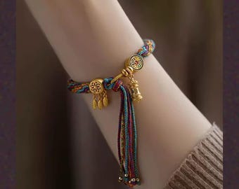 Tibetan Prayer Wheel Bracelet, Braided Rainbow Rope Charm Bracelet with Gold Mandala Bead, Spiritual Gift