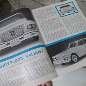 May include: A magazine spread featuring a black and white photo of a 1960s Chrysler Valiant car. The magazine article discusses the technical aspects of the car, including its design, engine, and performance. The text on the page reads "Chrysler's Valiant: A penetrating technical analysis of Detroit's latest compact."
