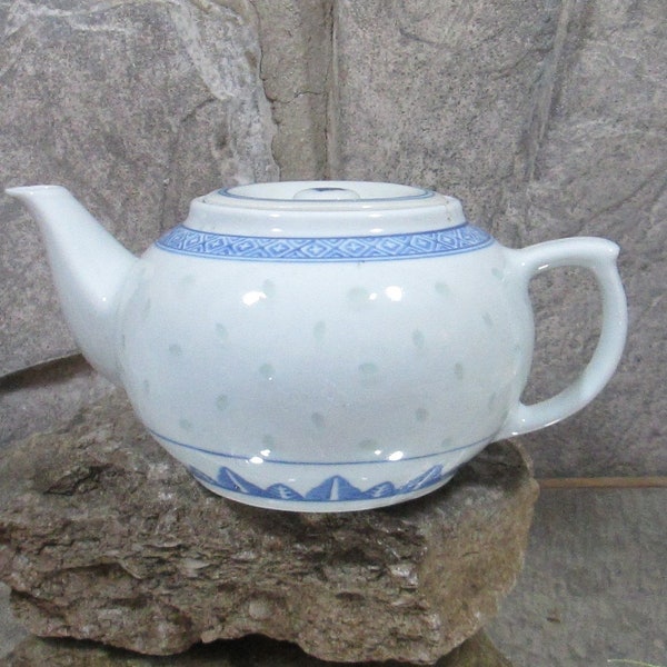 Teiera cinese vintage di fiori di riso