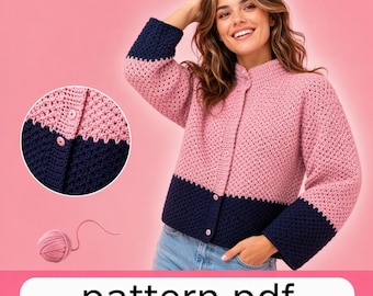 May include: A crochet cardigan featuring a color-blocked design with a light pink upper section and a dark navy blue lower section and sleeve cuffs. The garment has a button-down front with matching buttons and a circular inset detail. Includes a ball of pink yarn.