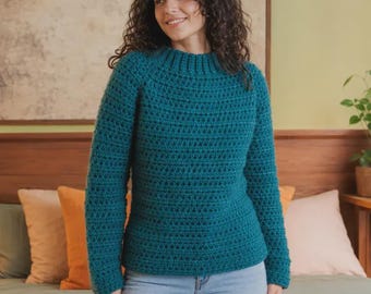 May include: A teal long-sleeved sweater featuring a ribbed mock neck collar and a textured crochet knit pattern. The garment has a fitted silhouette with long sleeves and a straight hemline, crafted from a solid-colored yarn in a deep blue-green hue.