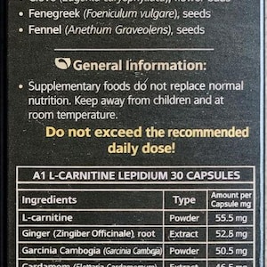 Puede incluir: Caja de suplemento negra con texto que enumera ingredientes como L-carnitina, jengibre y maca. La etiqueta incluye una tabla que detalla la cantidad por c&aacute;psula en miligramos. El producto es A1 L-Carnitine Lepidium 30 C&aacute;psulas.