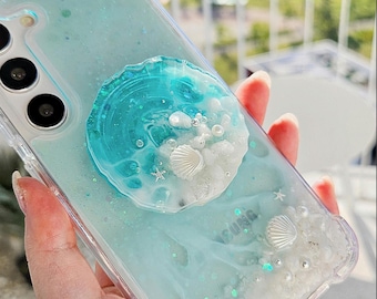 "Handgefertigte ""Piece of the Sea"" Handygriffe & Handyhülle aus Resin mit authentischem weißem Sand."