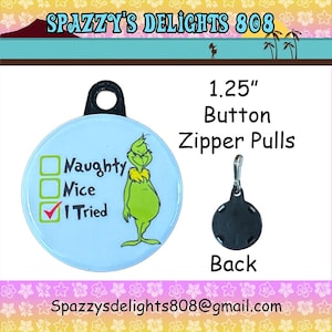 May include: A 1.25-inch round button zipper pull featuring a light blue background with a green character illustration next to a checklist with the text Naughty, Nice, and I Tried with a red checkmark. The back is black with a metal clip.
