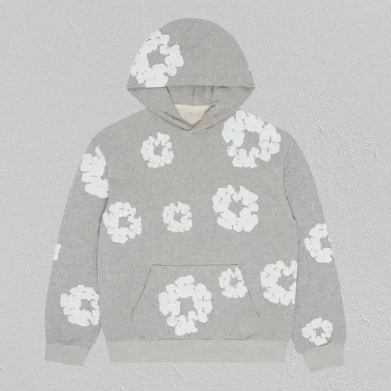 May include: A grey hoodie with white floral patterns. The hoodie has a hood, a front pocket, and ribbed cuffs and hem. White floral designs are scattered across the front, back, and sleeves.