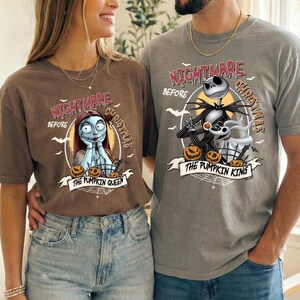 May include: A brown t-shirt featuring Sally from The Nightmare Before Christmas with the text Nightmare Before Christmas The Pumpkin Queen and a gray t-shirt featuring Jack Skellington and Zero with the text Nightmare Before Christmas The Pumpkin King.