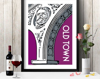 May include: A black and white illustration of an archway with a stylized face in the top corner. The archway is on a purple background with the text "OLD TOWN" in white.