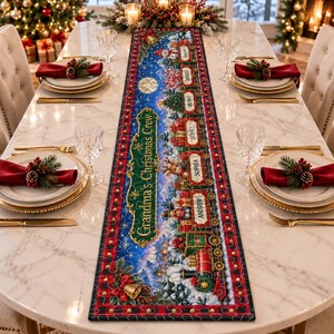 May include: A rectangular Christmas table runner featuring a festive train illustration with the text Grandma's Christmas Crew. The design includes a snowy landscape, pine trees, and gift-filled train cars with name labels on a dark blue background.