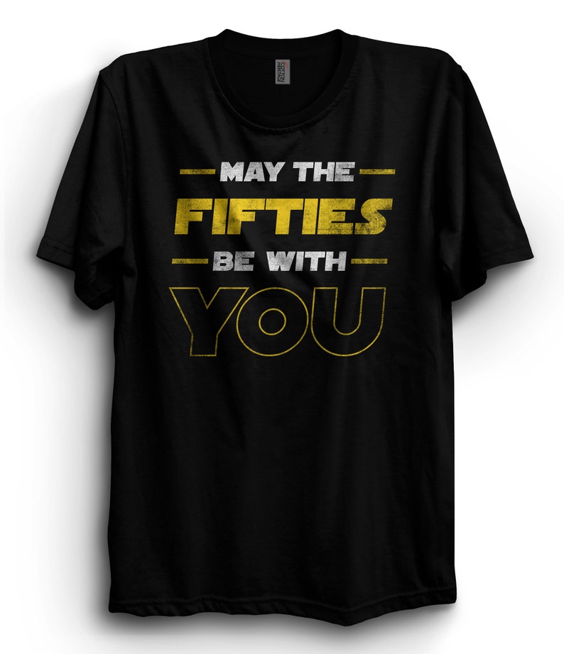 May include: Black t-shirt with a yellow graphic that says "May the Fifties Be With You".