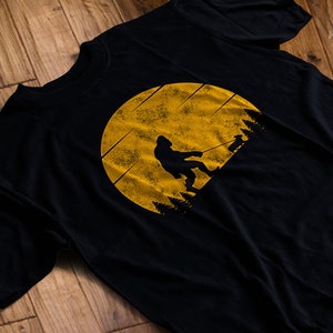 Bigfoot Walking a Corgi T-Shirt | Sasquatch Dog tshirt | Funny Sasquatch Shirt | Corgi Lover Gift | Free Shipping