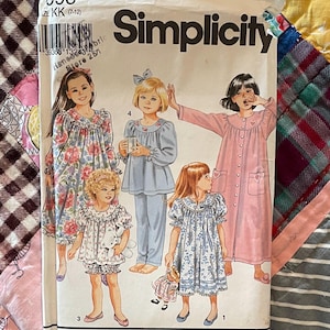 May include: Simplicity sewing pattern number 193 for girls' nightgowns. The pattern includes four different styles of nightgowns, all with floral prints. The pattern is for sizes 7-12.