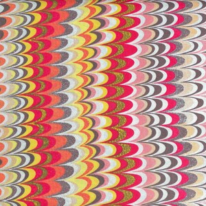 May include: A fabric with a repeating pattern of curved lines in shades of red, orange, yellow, white, grey, and brown. The pattern resembles overlapping scales or feathers.
