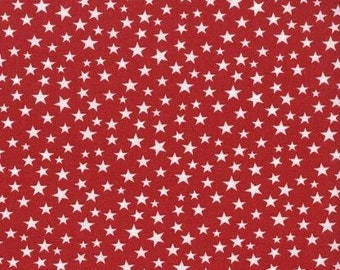 May include: Red fabric with a white star pattern. The stars are of varying sizes and are scattered randomly across the fabric.
