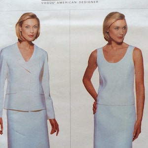 May include: Two women wearing white outfits. The woman on the left is wearing a white blazer and skirt. The woman on the right is wearing a white sleeveless top and skirt. The text "DONNA KARAN NEW YORK VOGUE' AMERICAN DESIGNER" is at the top of the image.