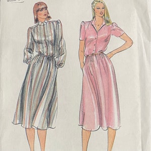 May include: Two women's dress patterns with a button-up shirt bodice and a gathered skirt. The dress on the left is striped and has long sleeves. The dress on the right is solid pink and has short sleeves.