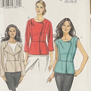May include: Vogue Patterns sewing pattern featuring three jacket designs. The jackets are shown in red, beige, and teal. Each jacket has a unique asymmetrical design with button closures and tailored details. The pattern includes various sizes and style options.
