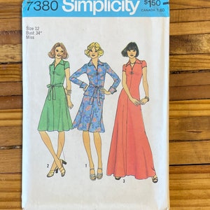 May include: A vintage sewing pattern for three different dresses. The pattern is for size 12, bust 34 inches, and is for misses. The dresses are shown in green, blue with floral print, and red.