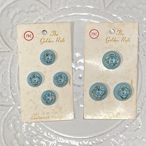 Boutons en plastique bleu ciel et or vintage sur carte originale, la règle d'or