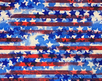 May include: Red, white, and blue fabric with a pattern of stars on a striped background. The fabric is perfect for crafting projects, like making patriotic quilts, pillows, or bags.